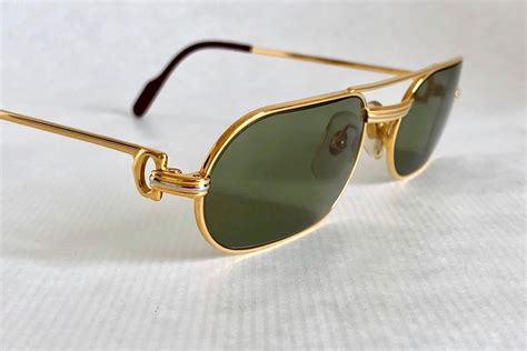 cartier solid gold glasses.